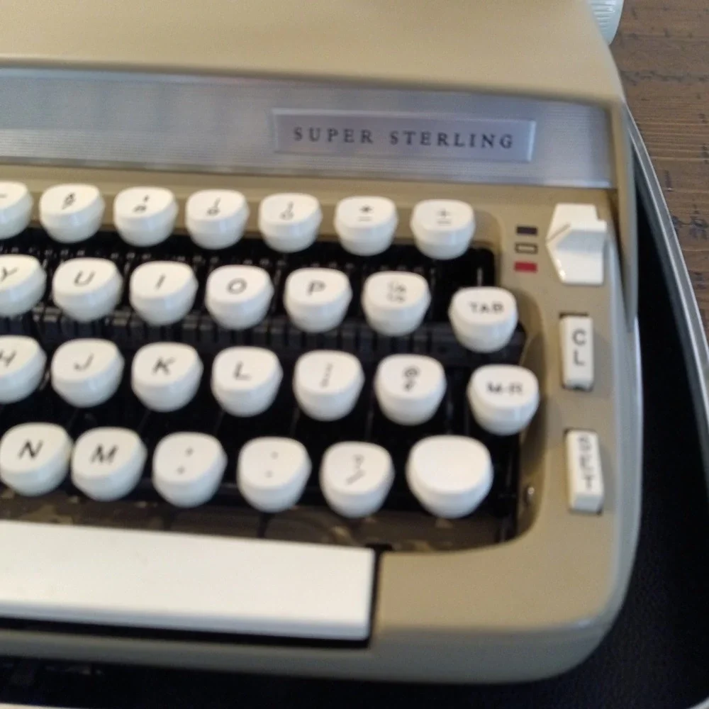 SCM Smith-Corona Super Sterling Portable Manual Typewriter with Case and Key